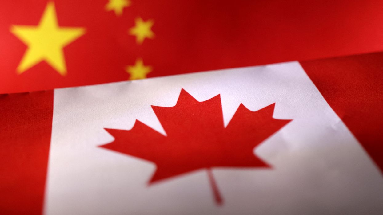 Printed Chinese and Canada flags.