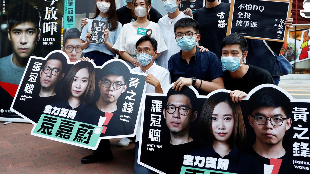 Pro-democracy activists campaigning during primary elections to select opposition candidates in Hong Kong, China. Reuters