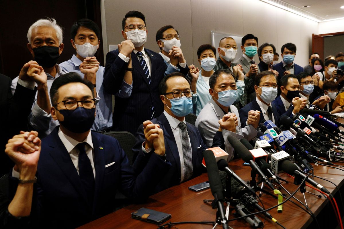 Pro-democracy legislators announce their resignation from the Legislative Council in Hong Kong. Reuters