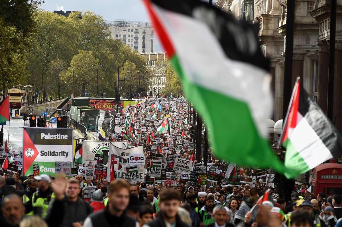 ​Pro-Palestine protesters march in London.