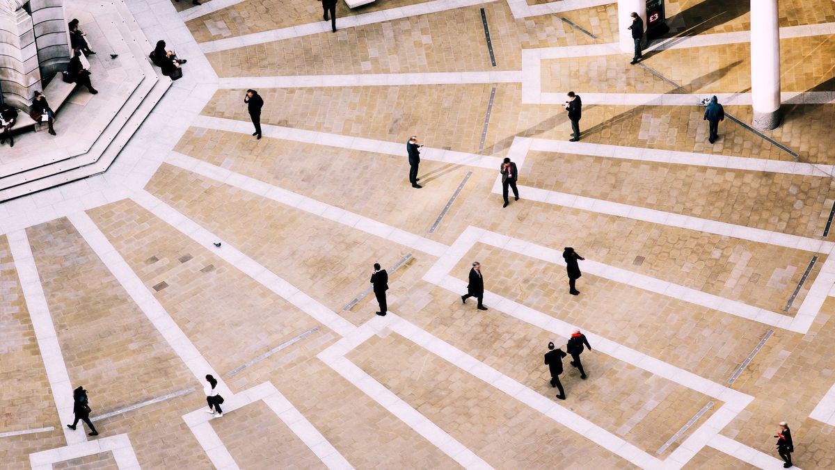 Professionals walking in a workspace