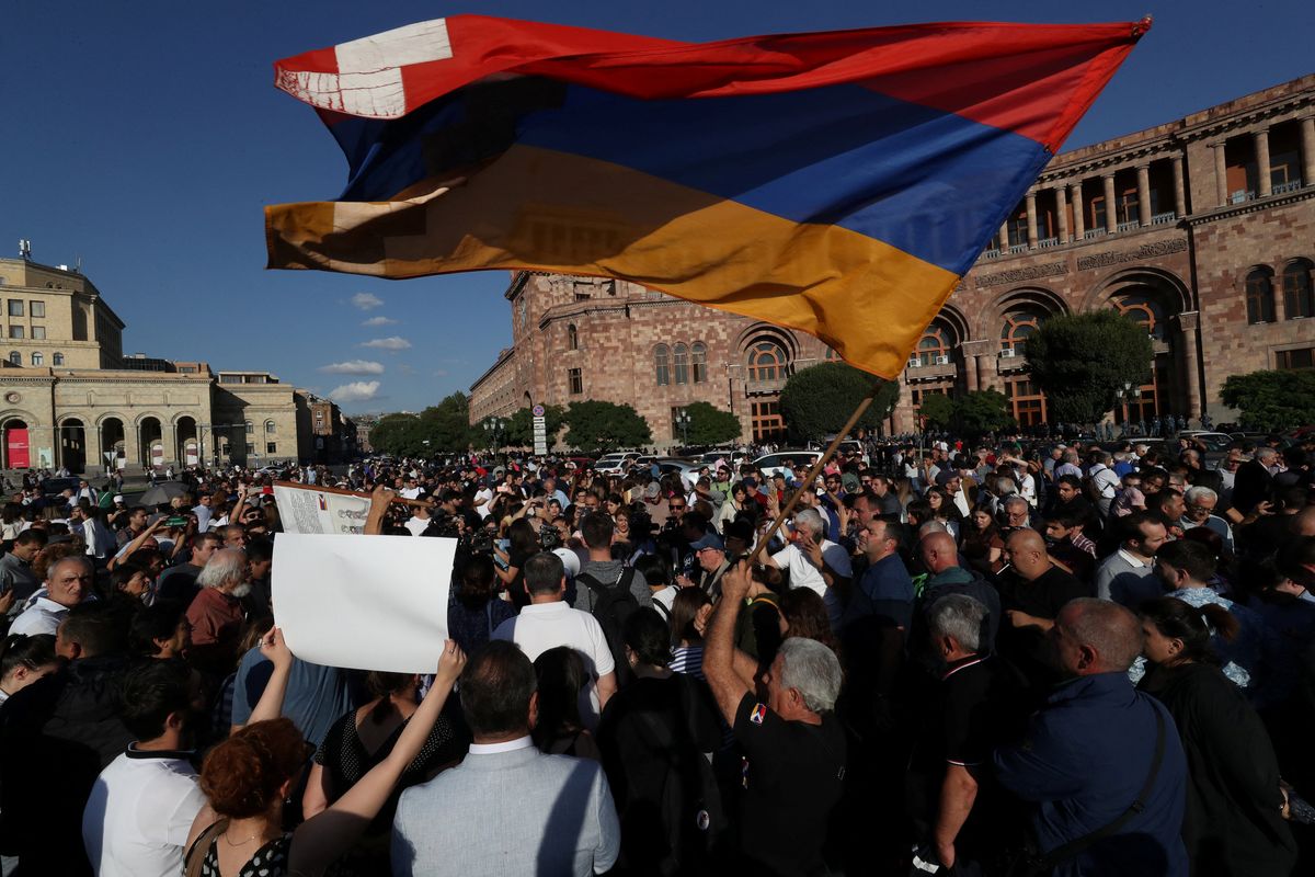 Protesters gather near the government building, after Azerbaijan launched a military operation in the region of Nagorno-Karabakh, in Yerevan, Armenia