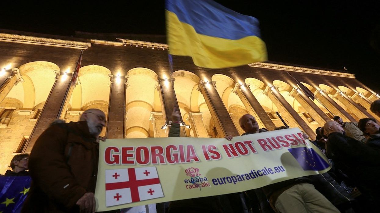 Protesters, including supporters of Georgia's opposition parties, hold a rally to dispute the Georgian Dream's declared victory in the weekend's parliamentary election in Tbilisi, Georgia, on Oct. 28, 2024.
