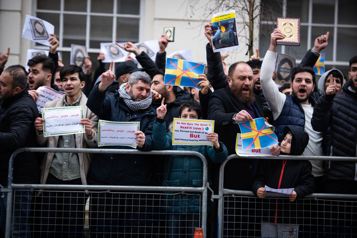 Protestors chant slogans during the demonstration against the Quran Burning In Sweden.