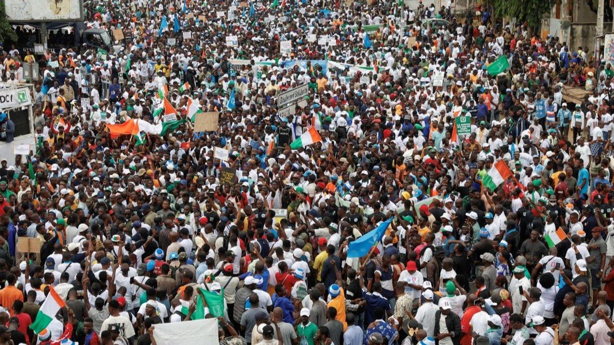 Protestors in in Abidjan, Ivory Coast, march against the removal of their opposition leaders from the electoral list, on August 9, 2025.