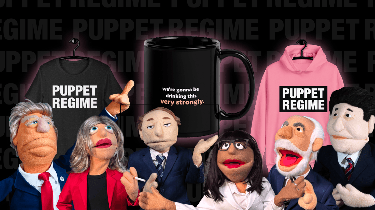 Puppet Regime puppets with a background of Puppet Regime merch