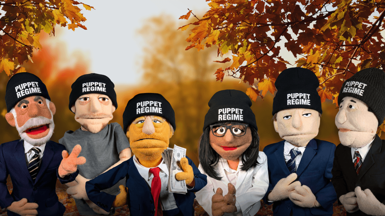 Puppets wearing a Puppet Regime beanie with a fall background
