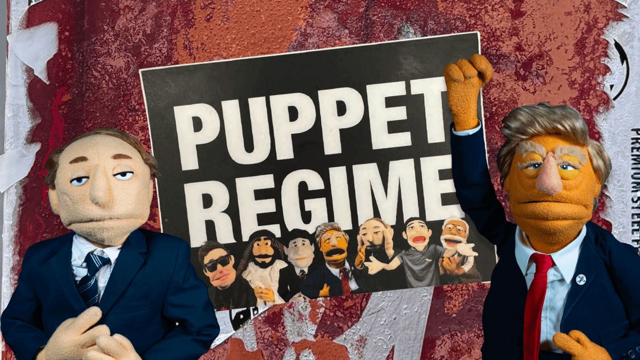 Putin and Trump's puppets holding a Puppet Regime poster