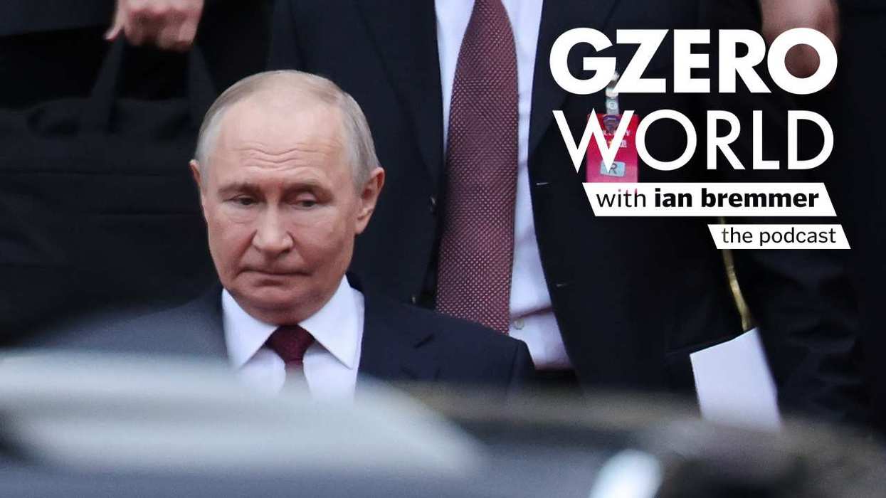 Putin staring at a car with the logo of GZERO World with Ian Bremmer the podcast