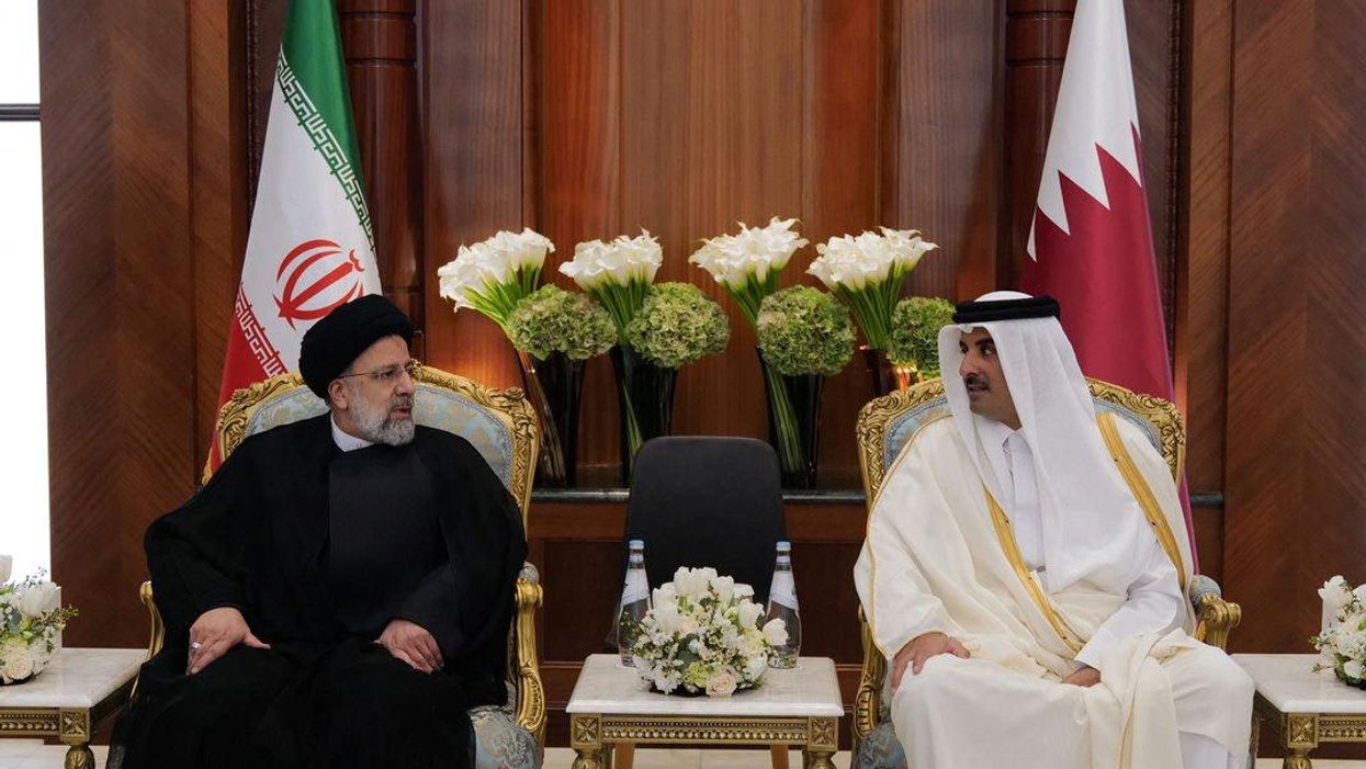 Qatar's Emir Sheikh Tamim bin Hamad Al-Thani meets with Iran's President Ebrahim Raisi, in Doha.