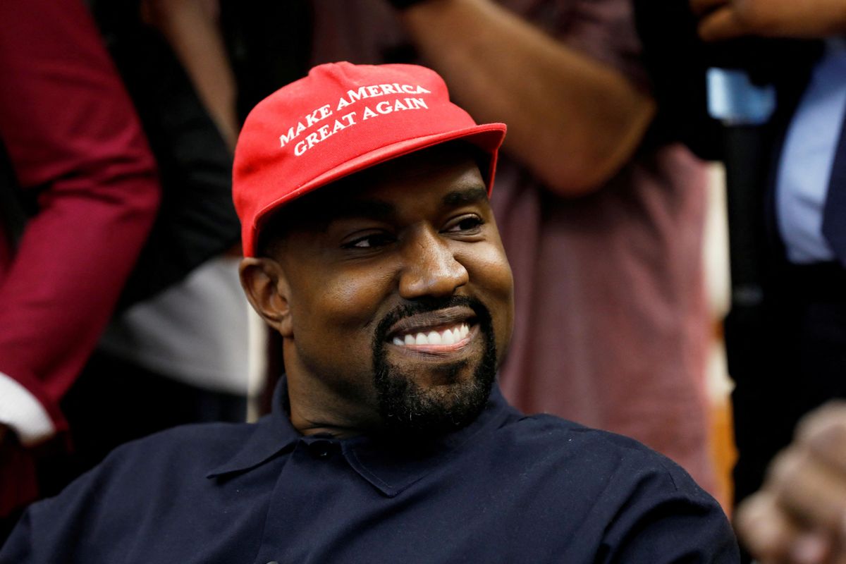 Rapper Kanye West smiles during a meeting with US President Donald Trump at the White House. 