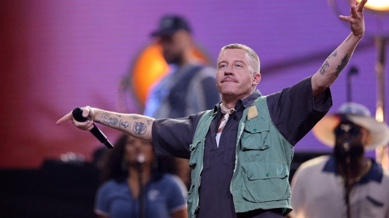 Rapper Macklemore performs during the opening ceremony of the Invictus Games, in Duesseldorf, Germany.