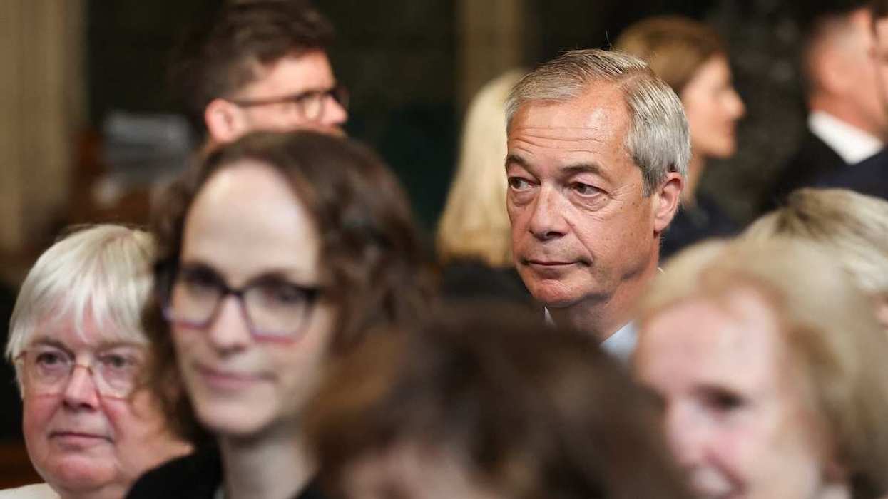 Reform UK Leader Nigel Farage looks on at the House of Commons chamber