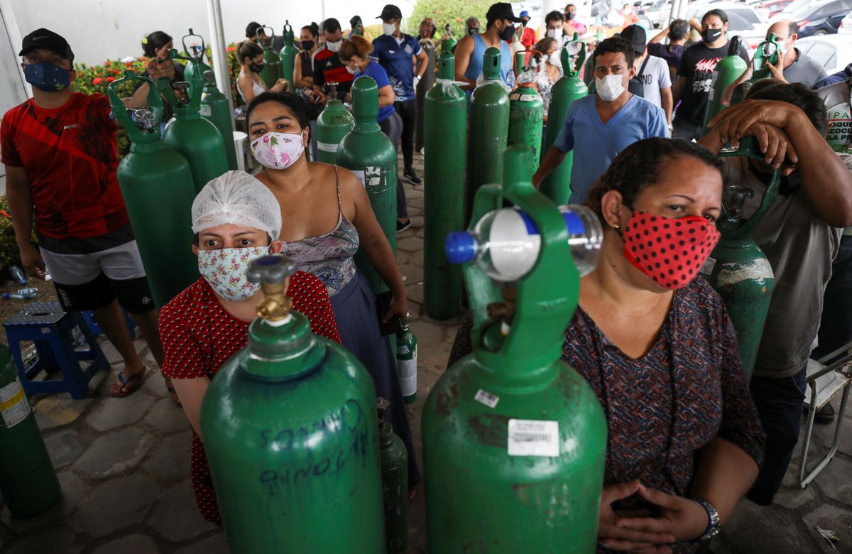 Relatives of COVID patients gather to buy oxygen in Manaus, Brazil. REUTERS/Bruno Kelly