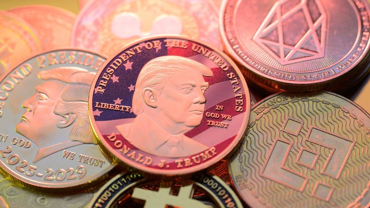 Representation of the $Trump meme coin together with Bitcoin and crypto coins, seen in this photo illustration.