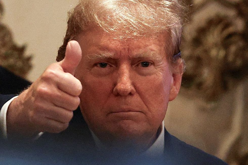 ​Republican presidential candidate and former US President Donald Trump gestures at a watch party event to mark the Super Tuesday primary elections at his Mar-a-Lago property, in Palm Beach, Florida, on March 5, 2024. 