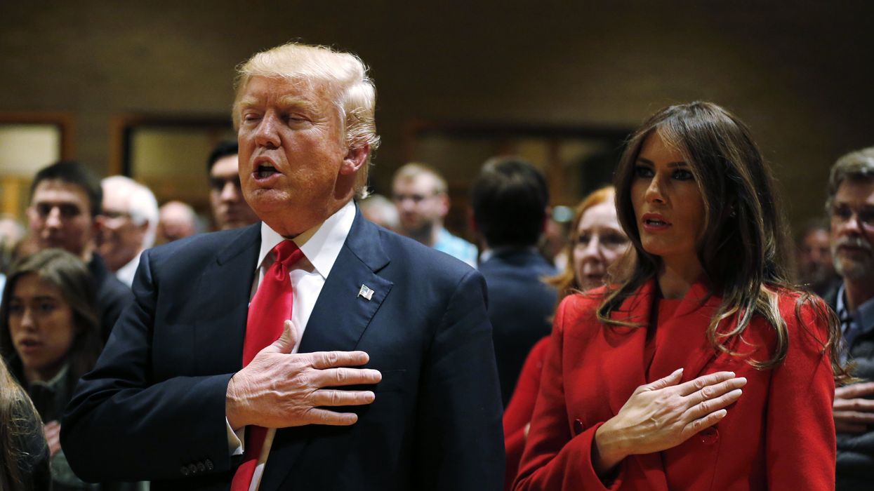 Republican Presidential Candidate Donald Trump recites the pledge of allegiance with his wife Melania, back in 2016.