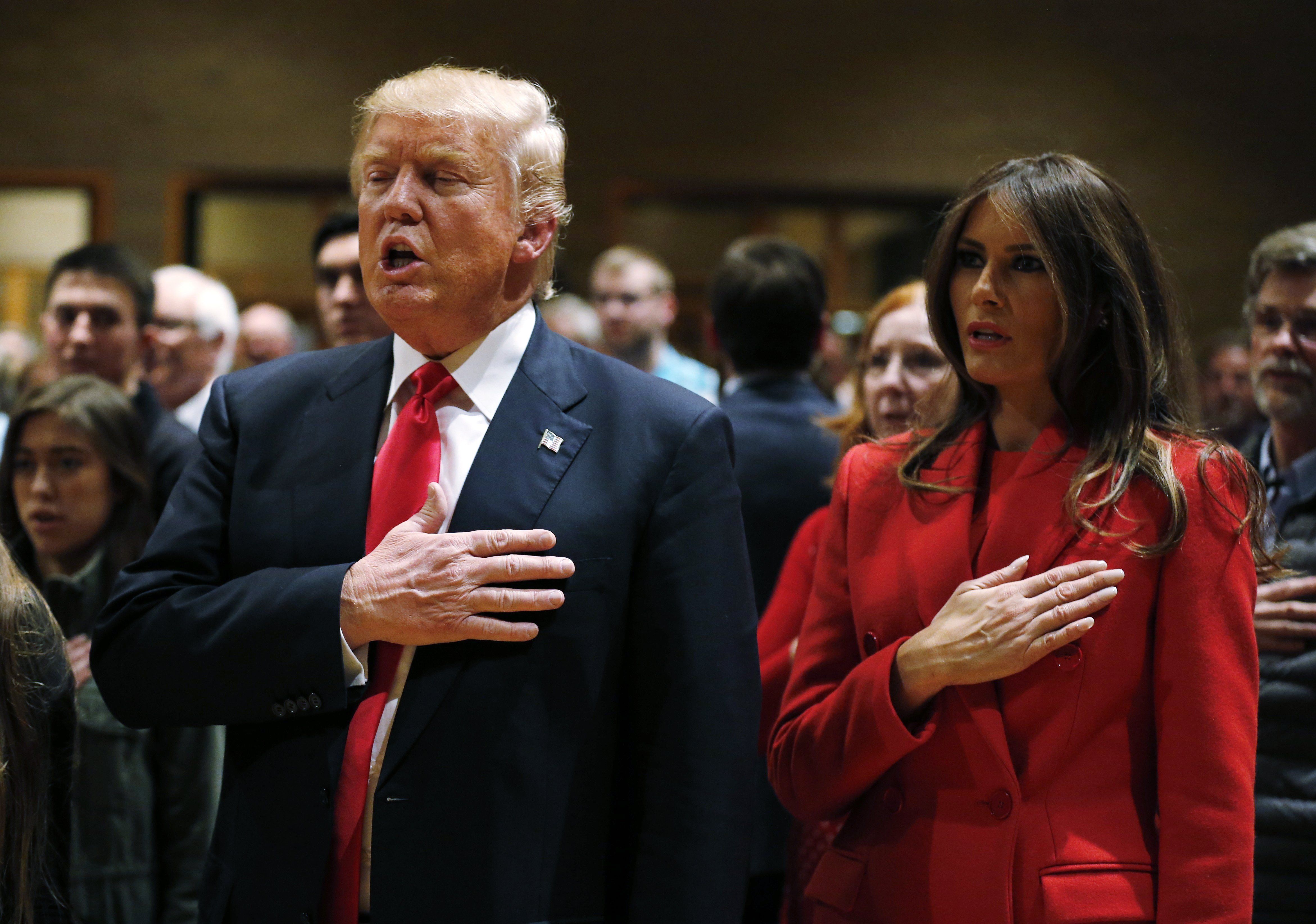 Republican Presidential Candidate Donald Trump recites the pledge of allegiance with his wife Melania, back in 2016.