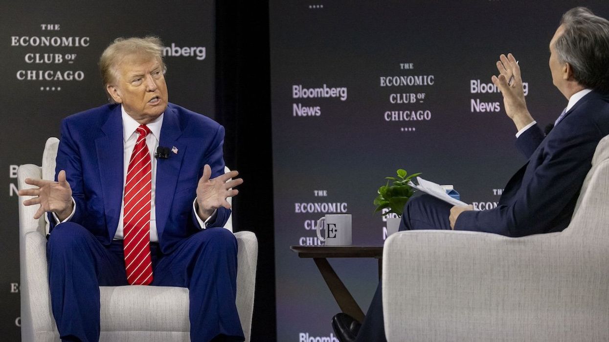 Republican presidential nominee and former President Donald Trump speaks with Bloomberg Editor-in-Chief John Micklethwait during an appearance with the Economic Club of Chicago on Tuesday, Oct. 15, 2024, at the Fairmont Hotel in Chicago.