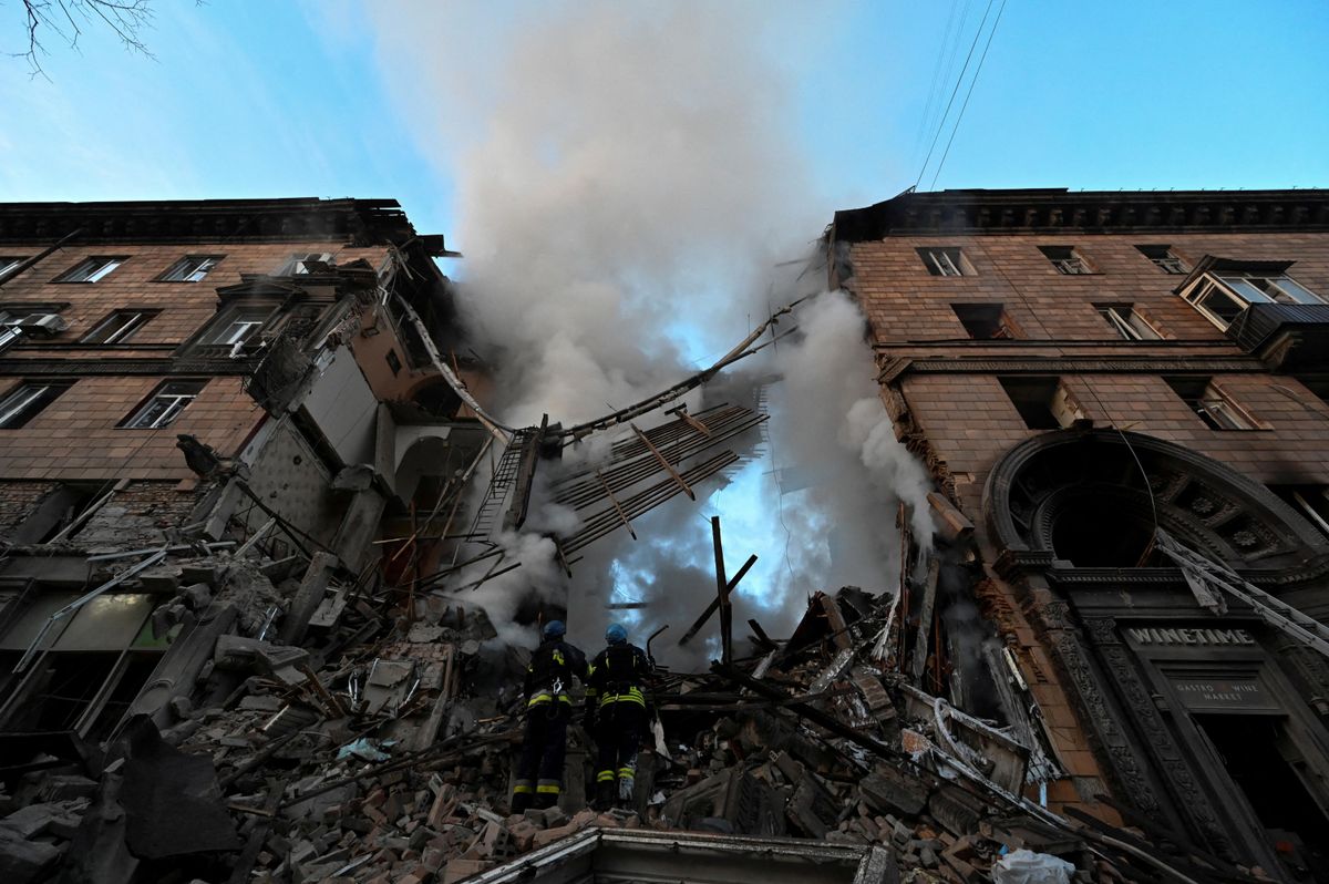 Rescuers work at a residential building heavily damaged by a Russian missile strike in Zaporizhzhia, Ukraine.