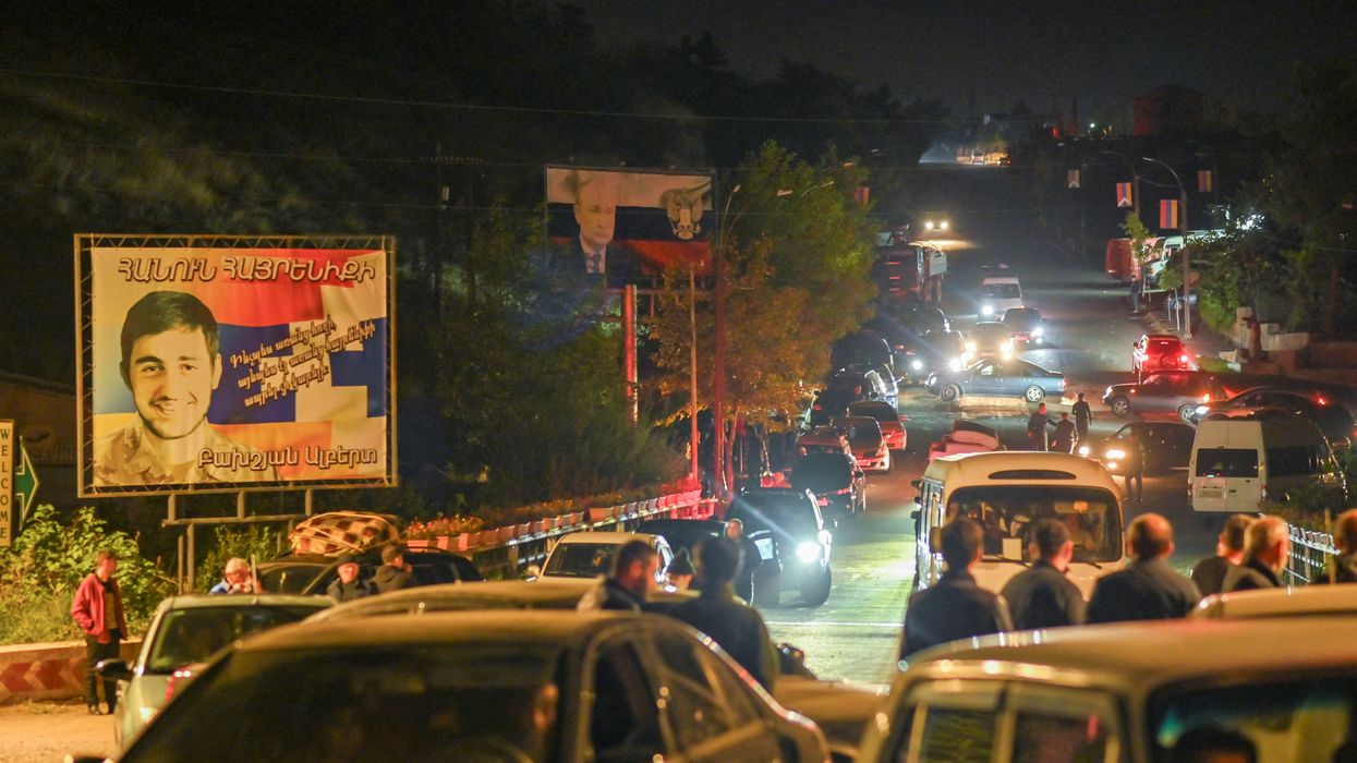 Residents use vehicles to leave the city of Stepanakert following a military operation conducted by Azerbaijani armed forces in Nagorno-Karabakh
