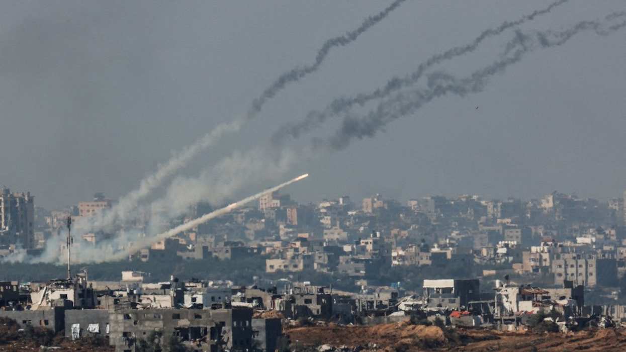 Rockets are launched from the Gaza Strip into Israel, after a temporary truce between Israel and the Palestinian Islamist group Hamas expired, as seen from Israel's border with Gaza in southern Israel, December 1, 2023