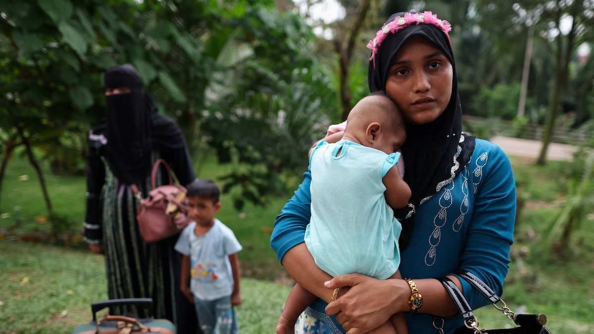 Rohingya refugees gather in front of the office of the U.N. refugee agency after being evicted from their homes, at Kuala Lumpur Malaysia. 