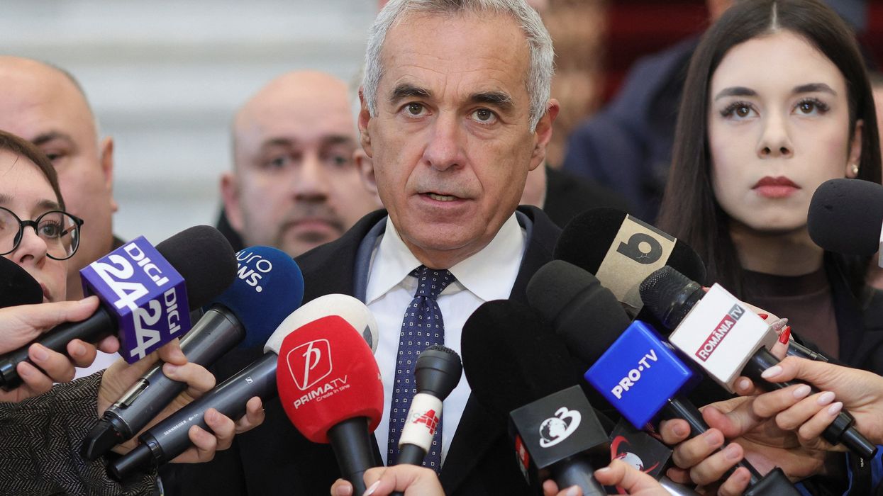 Romanian far-right presidential election candidate Calin Georgescu delivers a press statement at the Bucharest Court of Appeal, in Bucharest, Romania, December 19, 2024.