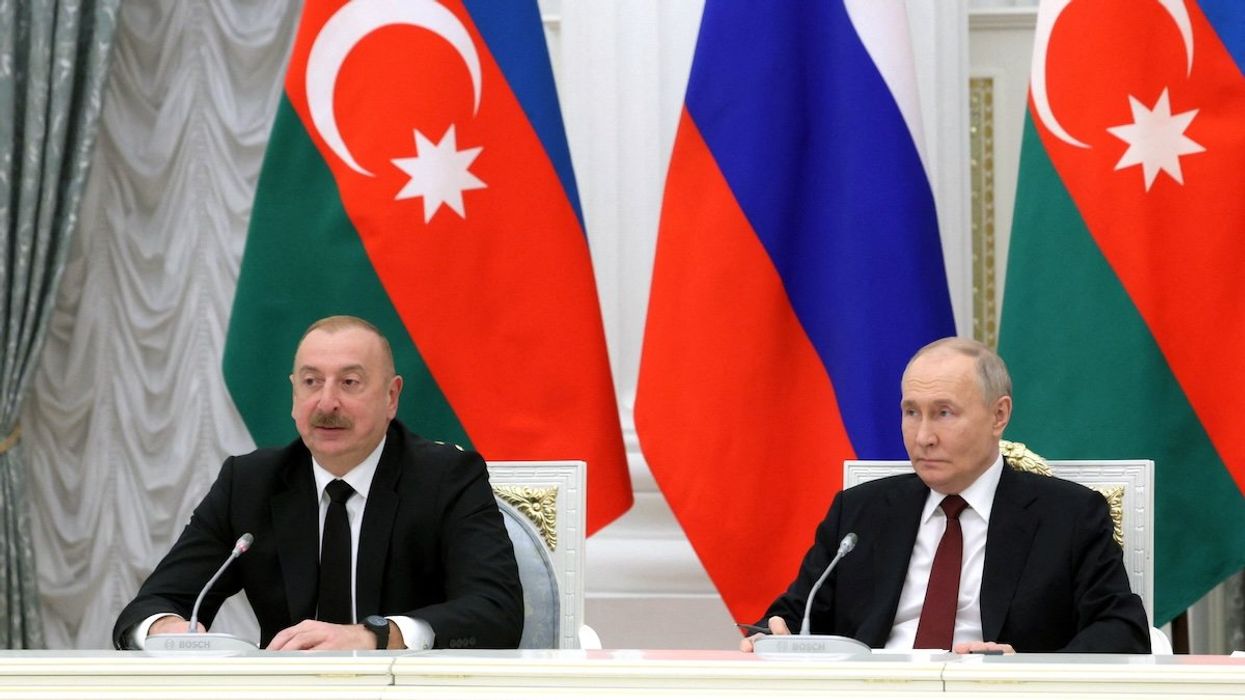 Russia's President Vladimir Putin and Azerbaijan's President Ilham Aliyev attend a meeting in Moscow, Russia, April 22, 2024.