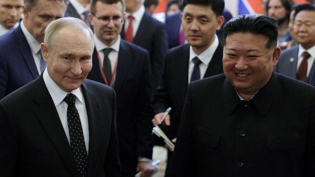 Russia's President Vladimir Putin and North Korea's leader Kim Jong Un arrive for a gala concert in Pyongyang, North Korea June 19, 2024.