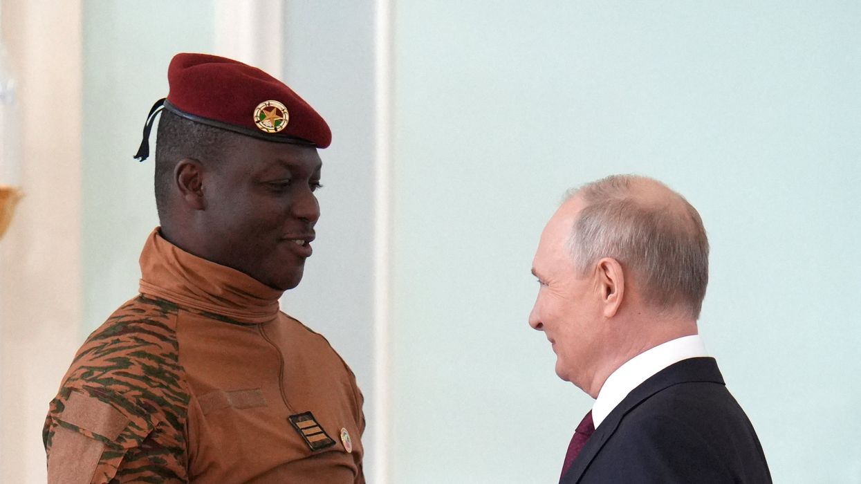 Russia's President Vladimir Putin shakes hands with Burkina Faso's interim President Ibrahim Traore at the Russia-Africa Summit in Russia in July.