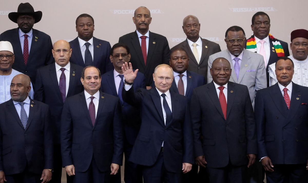 Russia's President Vladimir Putin waves during a family photo with heads of countries taking part in the 2019 Russia-Africa Summit at the Sirius Park of Science and Art in Sochi, Russia, October 24, 2019. 