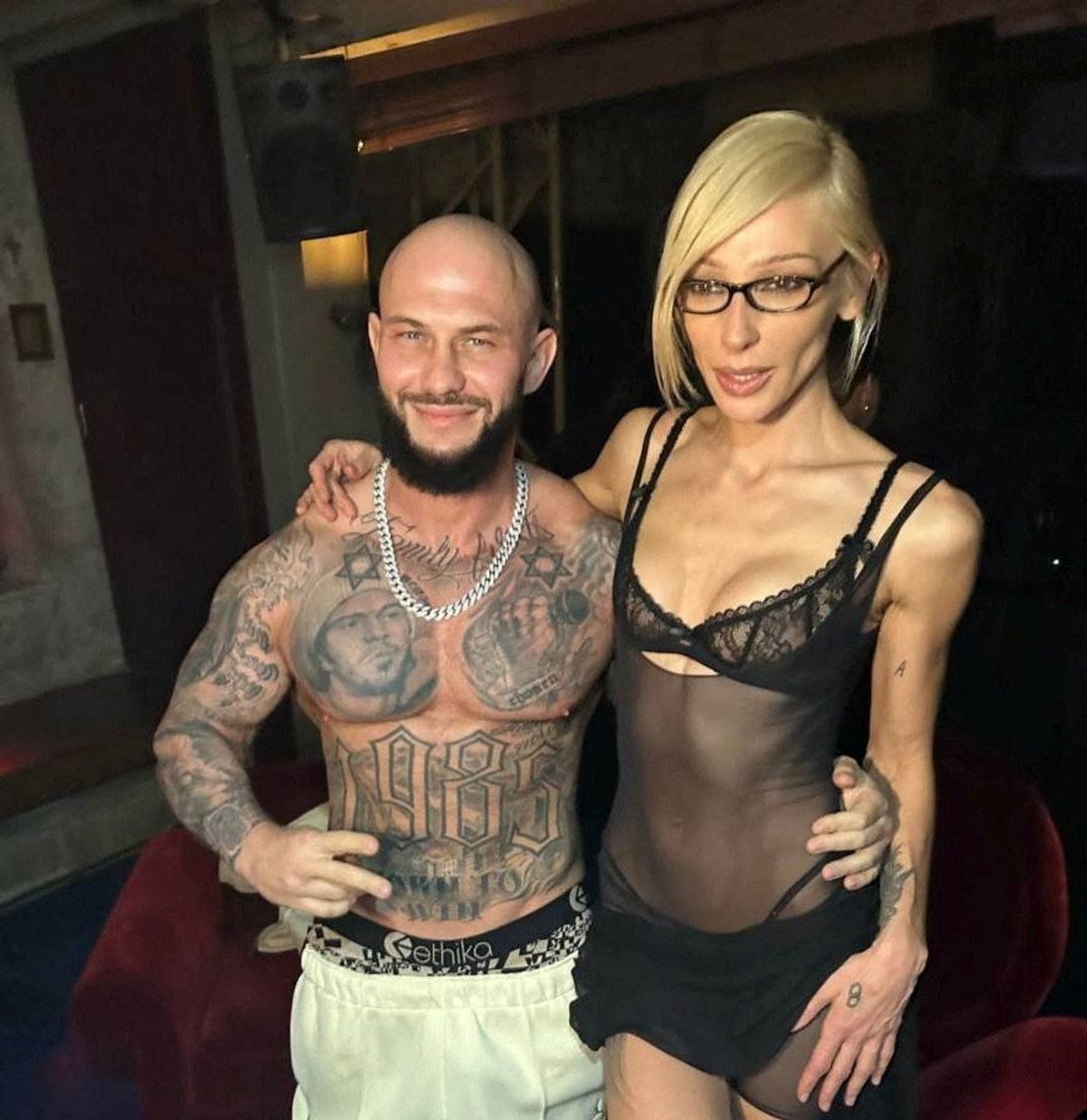 Russian blogger Anastasia (Nastya) Ivleeva poses for a picture with rapper GeeGun during an "almost naked" party at Mutabor nightclub in Moscow, Russia, in this image published December 21, 2023.