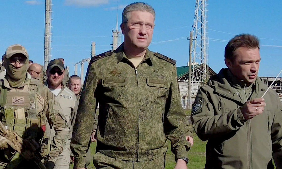 ​Russian Deputy Defence Minister Timur Ivanov inspects the construction of apartment blocks in Mariupol, Russian-controlled Ukraine, in this October 2022 image.