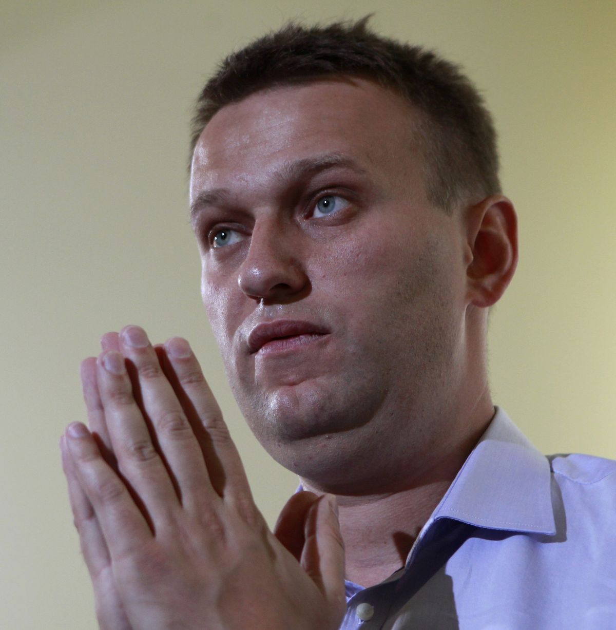 ​Russian lawyer and blogger Alexei Navalny speaks during an interview with Reuters 