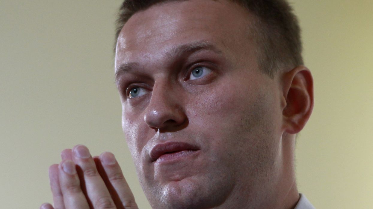 Russian lawyer and blogger Alexei Navalny speaks during an interview with Reuters