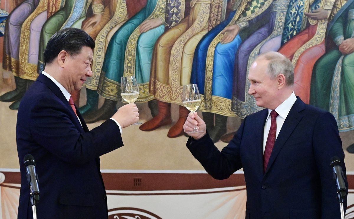 Russian President Vladimir Putin and Chinese President Xi Jinping attend a reception at the Kremlin in Moscow, Russia March 21, 2023.