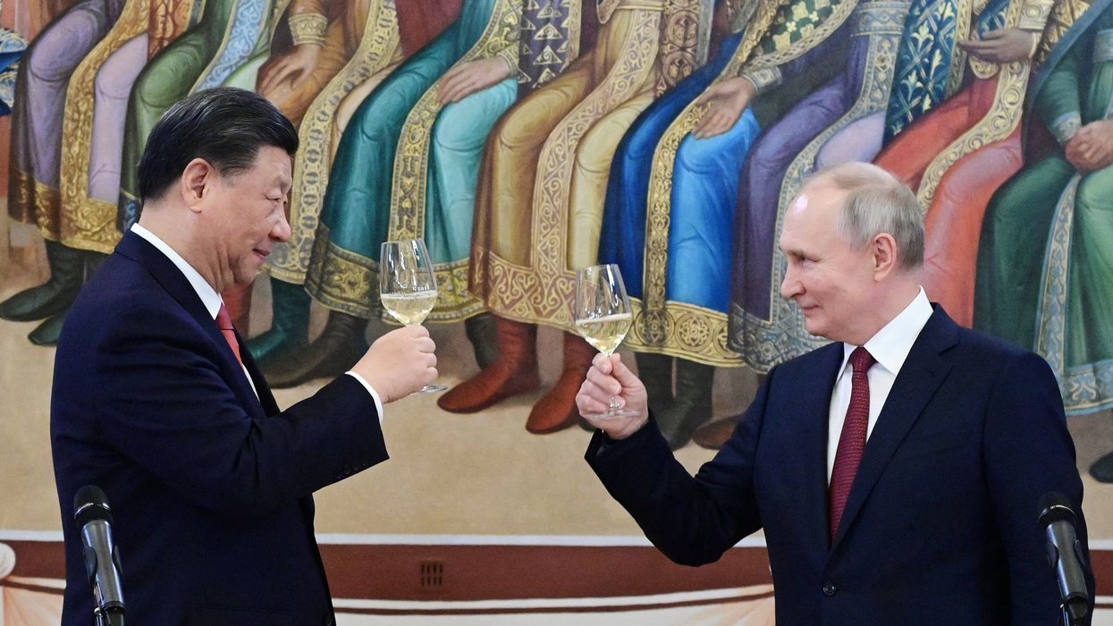 Russian President Vladimir Putin and Chinese President Xi Jinping attend a reception at the Kremlin in Moscow, Russia March 21, 2023.
