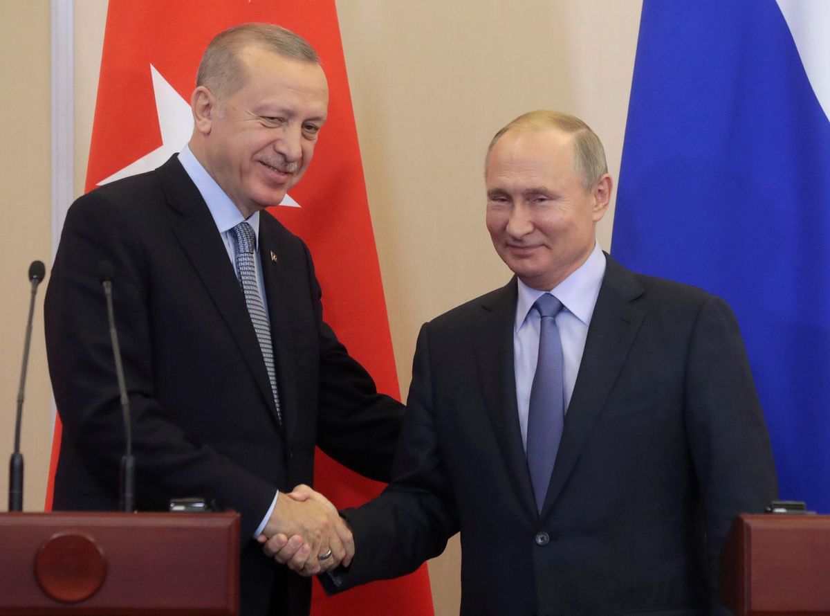 Russian President Vladimir Putin and Turkish President Recep Tayyip Erdogan shake hands during their joint news conference following Russian-Turkish talks in the Black sea resort of Sochi. Reuters