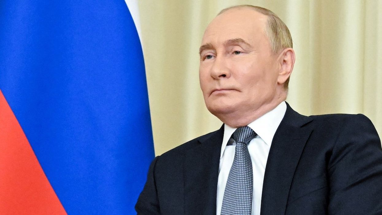 Russian President Vladimir Putin attends a meeting with Palestinian President Mahmoud Abbas outside Moscow, Russia August 13, 2024.