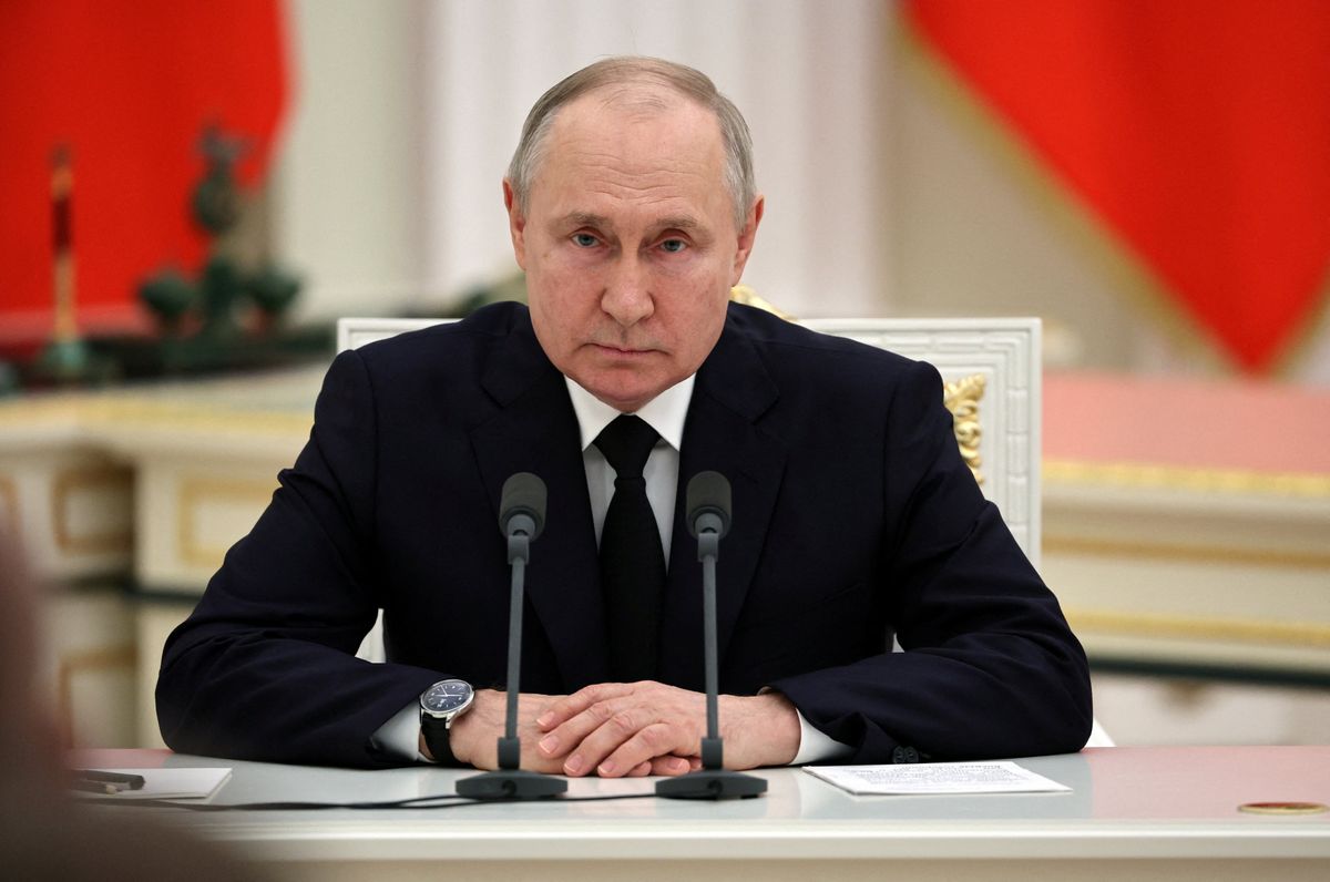 Russian President Vladimir Putin attends a televised meeting in Russia