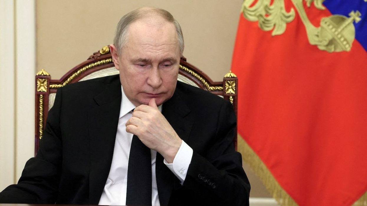 Russian President Vladimir Putin chairs a meeting to discuss the attack on the Crocus City Hall concert venue, outside Moscow, Russia, March 25, 2024.