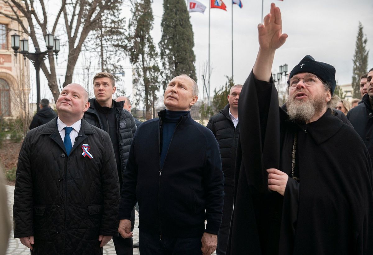 Russian President Vladimir Putin meets with local officials in Sevastopol, Crimea March 18, 2023.