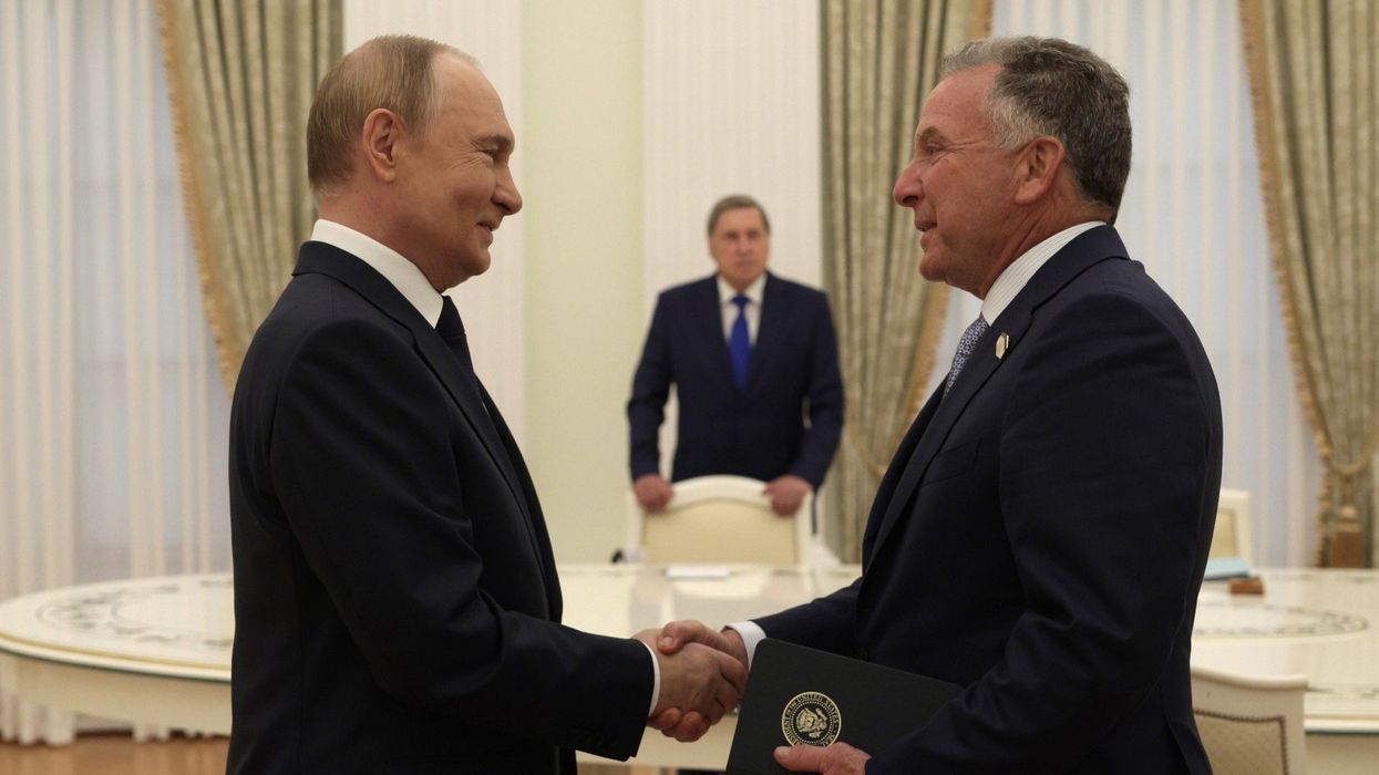 Russian President Vladimir Putin shakes hands with US special envoy Steve Witkoff ahead of Ukraine war talks.