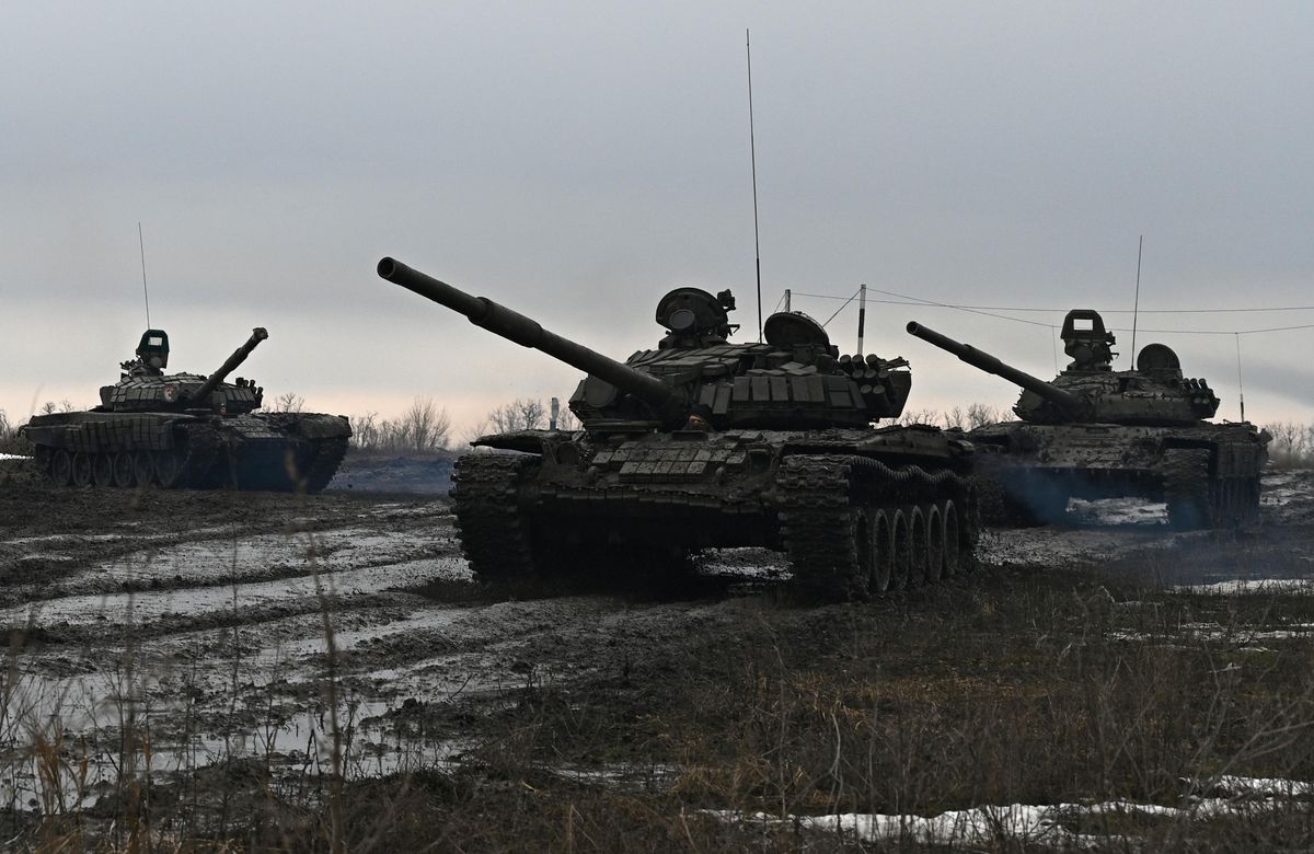 Russian service members drive tanks during drills held by the armed forces in the Rostov region, Russia.
