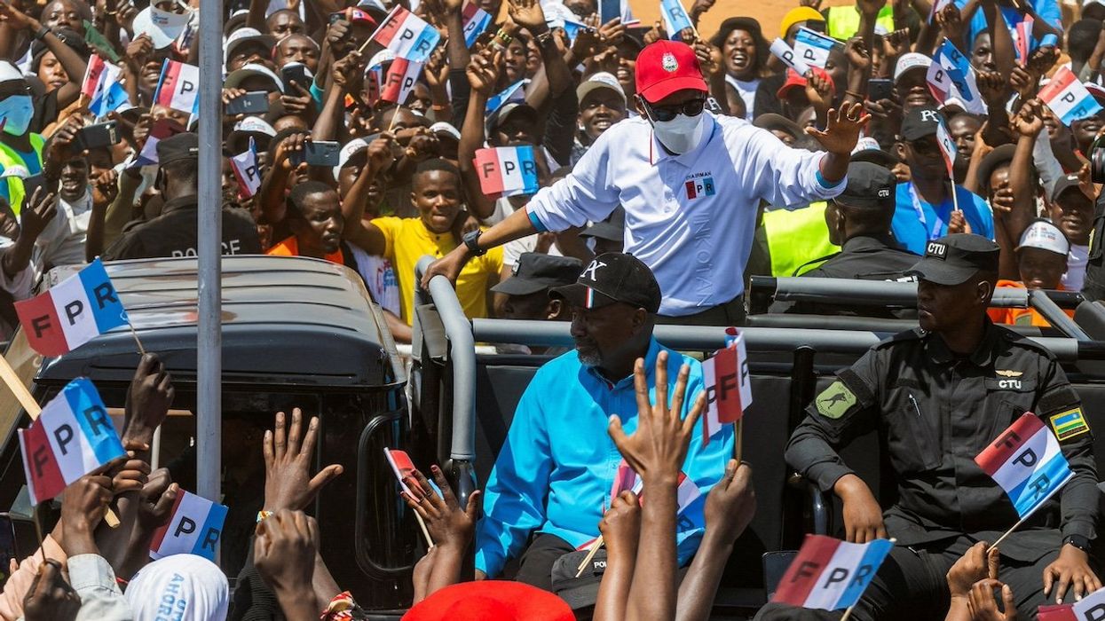 Rwanda's incumbent President and presidential candidate for the Rwandan Patriotic Front (RPF) Paul Kagame waves to his supporters as he arrives for his final campaign rally in Gahanga, Kicukiro district in Kigali, Rwanda, July 13, 2024.