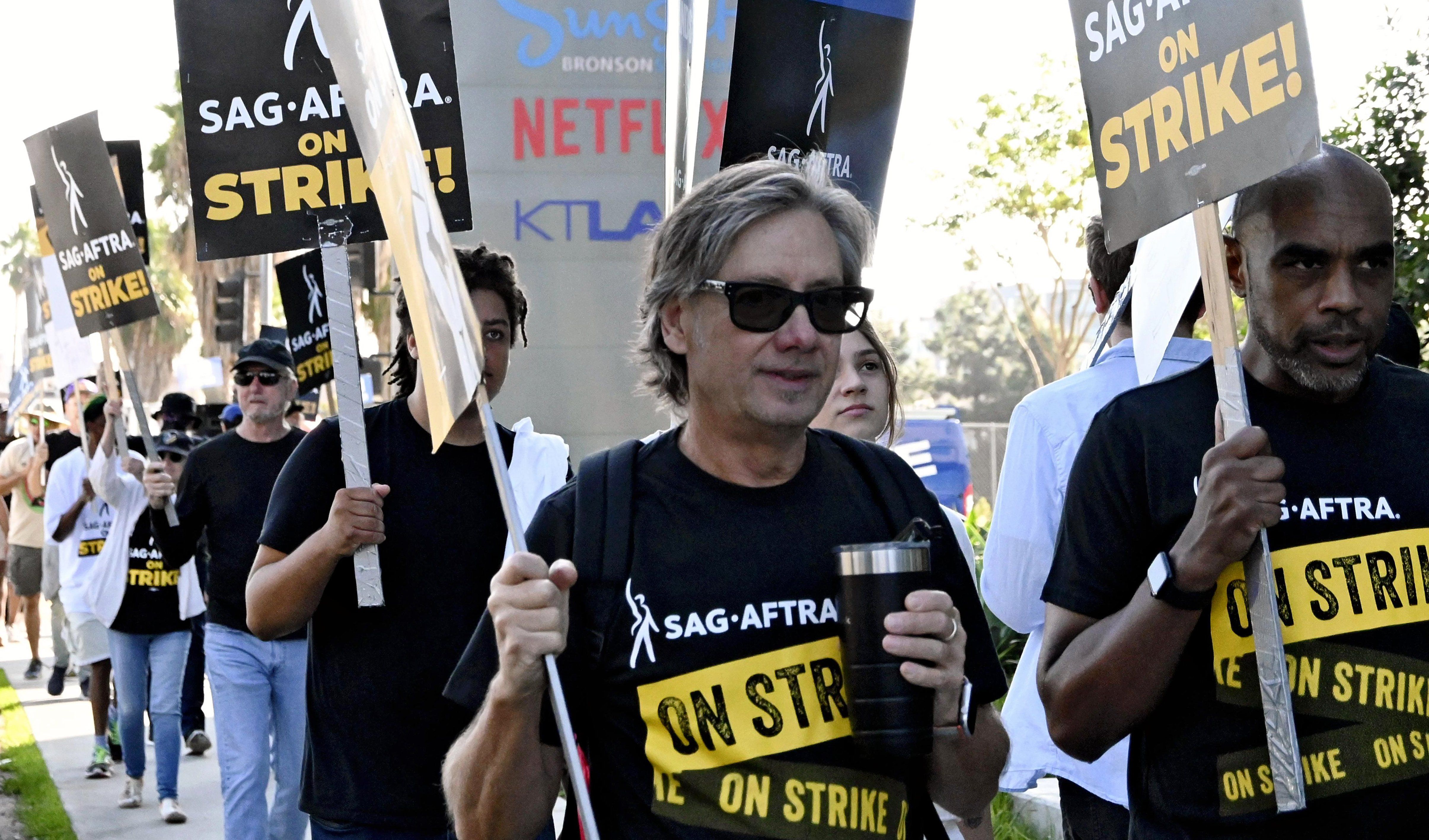 ​SAG-AFTRA actor union members demonstrate outside Netflix studios, in Los Angeles, on Oct. 24, 2023. 