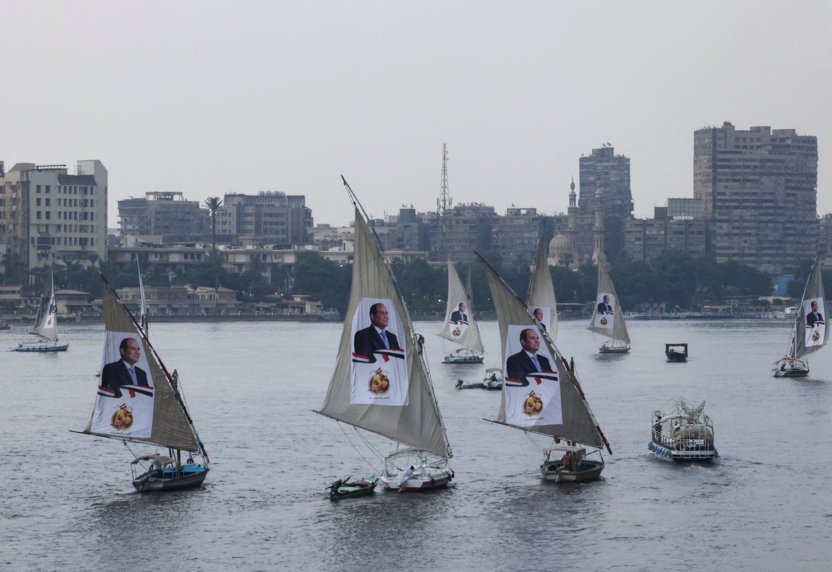 Sailboats bearing posters of Egyptian President Abdel Fattah al-Sisi take part in a rally on the River Nile to back his candidacy in the presidential elections in December, in Cairo, Egypt, October 2, 2023.