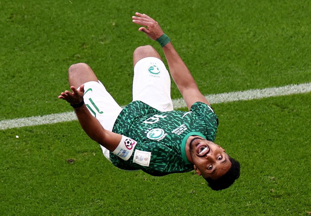 Salem Al-Dawsari celebrates scoring Saudi Arabia's second goal against Argentina.