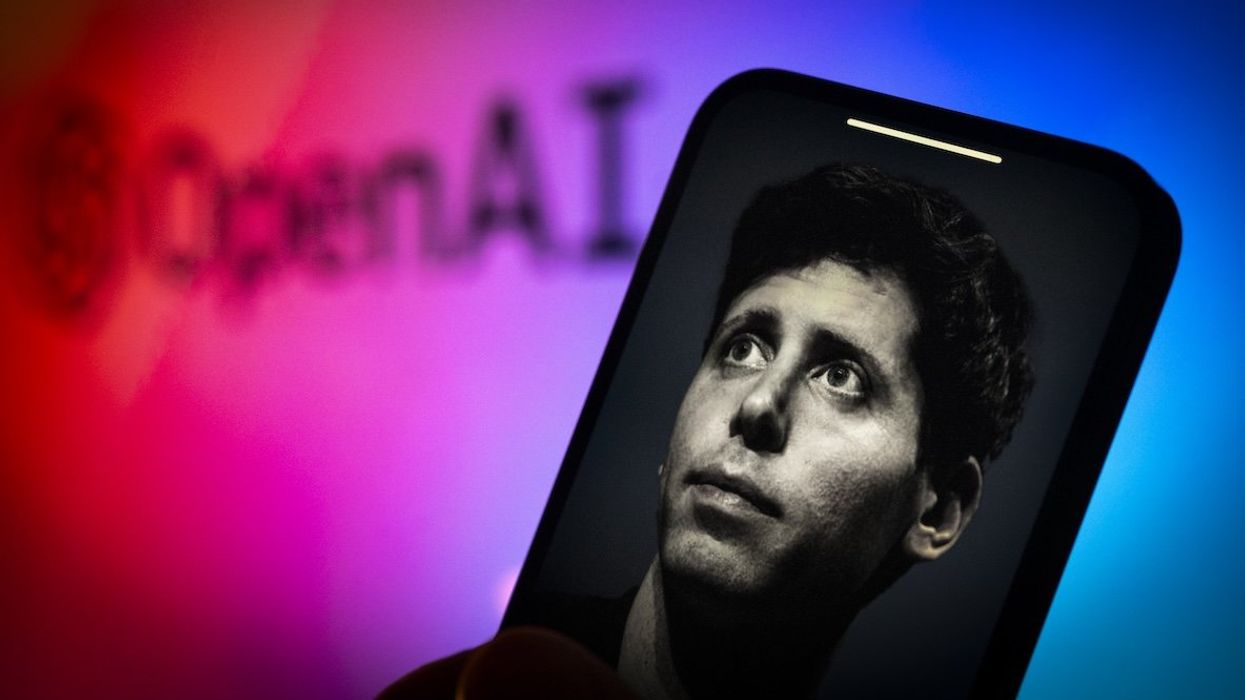 Sam Altman is seen on a mobile device screen next to an OpenAI logo in this illustration.